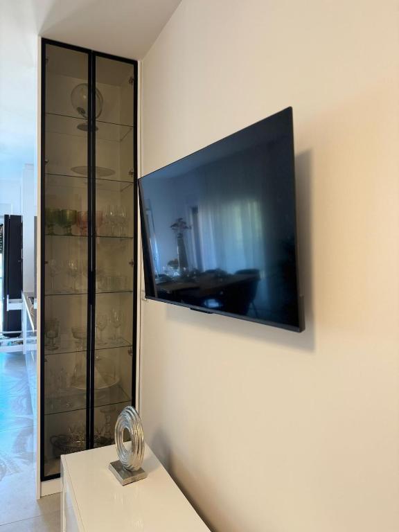 Smart TV and glass cabinet